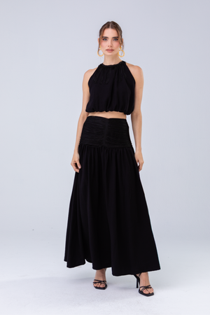 PTJ0103 falda negra con blusa con flecos