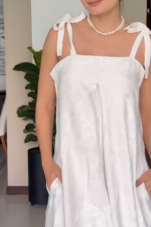 PTJ302629 enterizo oversize color blanco con lazos en los hombros con bolsillos
