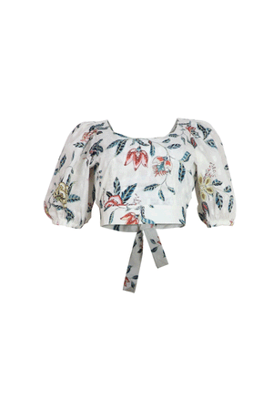Crop top blanco de tiras y escote con estampado sutil.