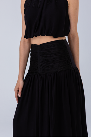 PTJ0104 falda con drapeado negro 