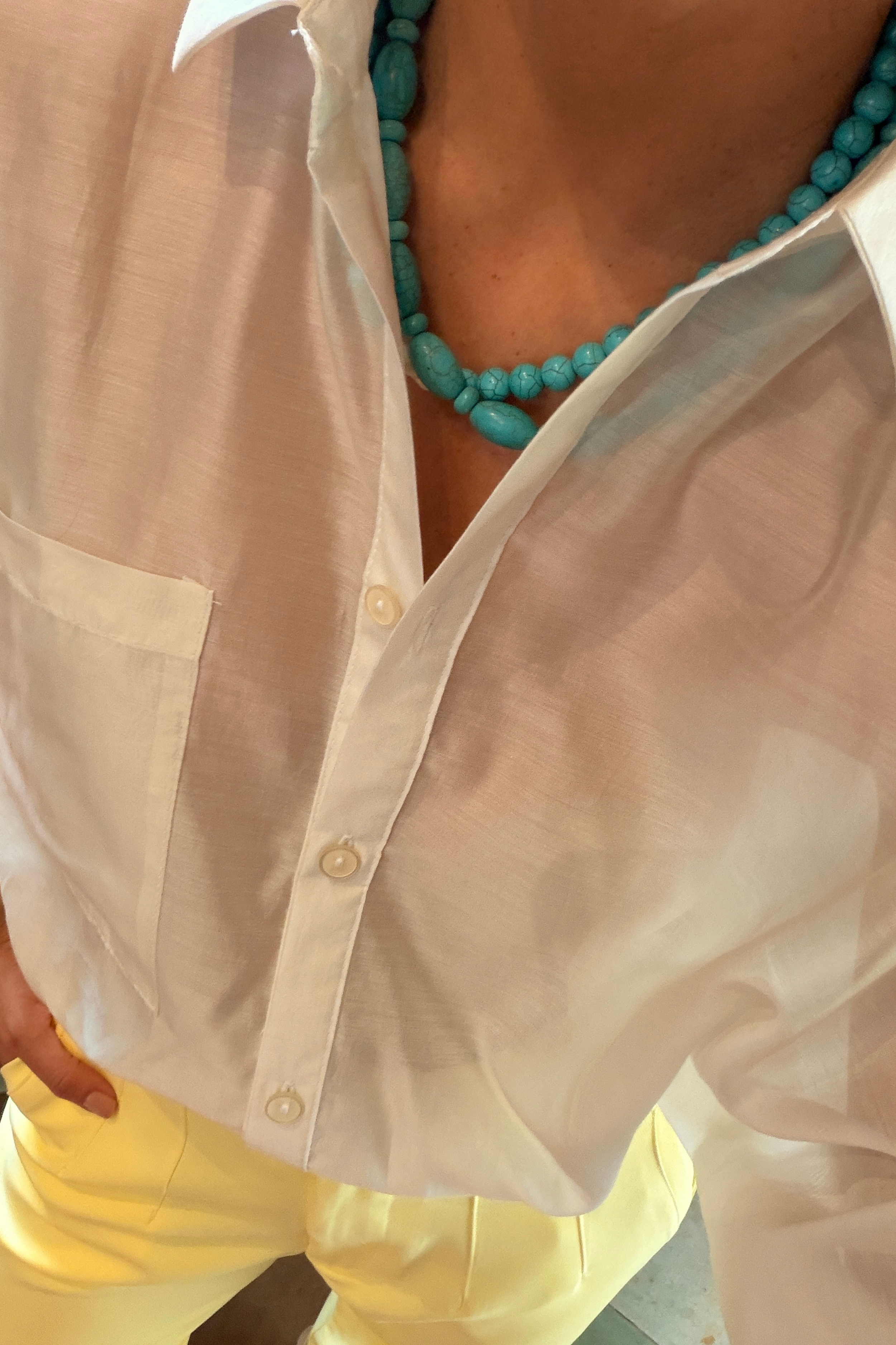 PTJ0138 blusa con botones y tela semi transparente 
