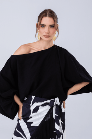 PTJ3075290 falda estampada con boleros y blusa negra