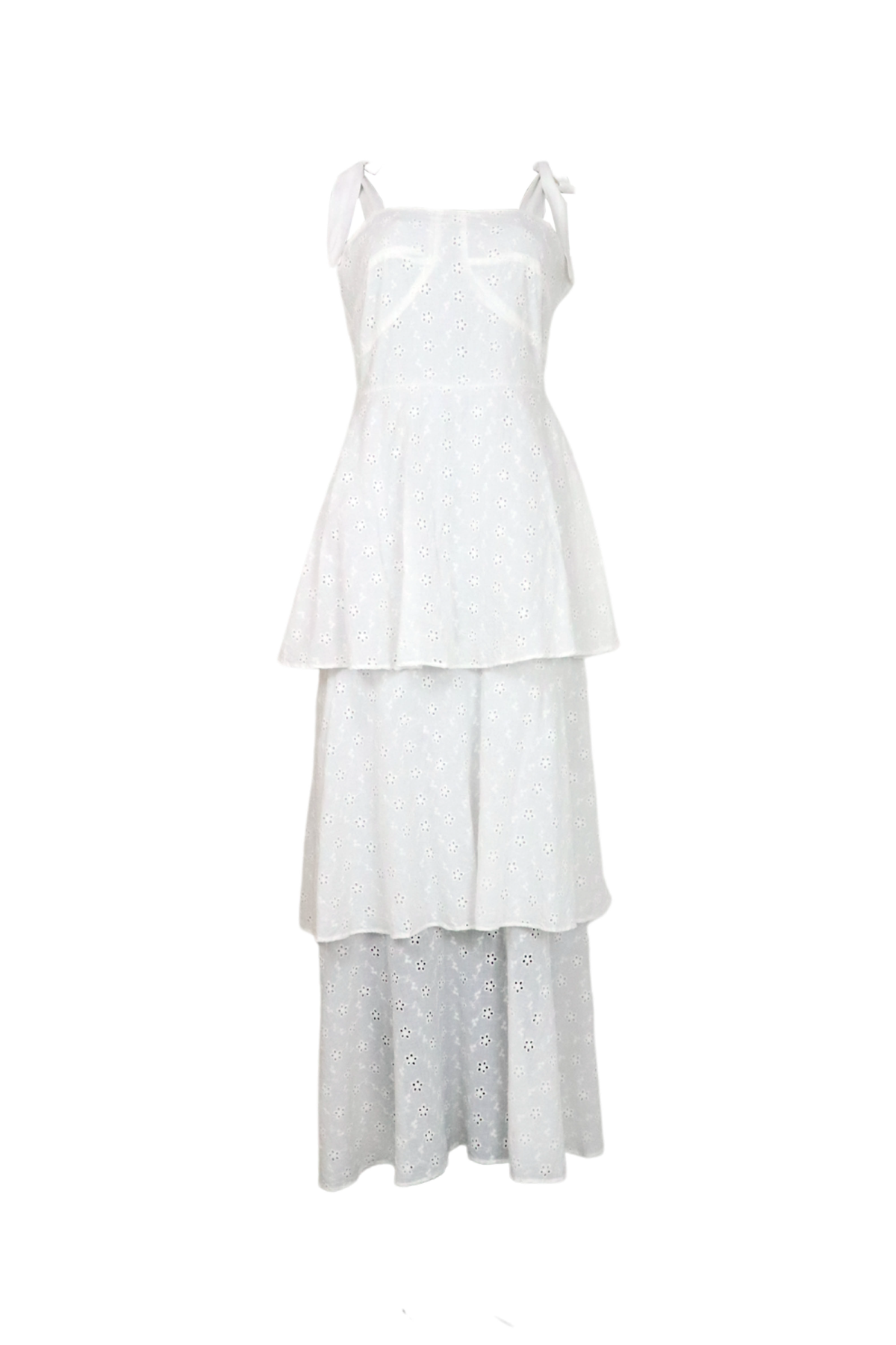 Vestido blanco y largo con volantes en la falda y tela en ojalillo.