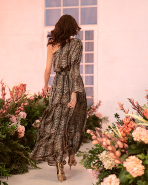 Vestido asimétrico con manga puff en animal print.