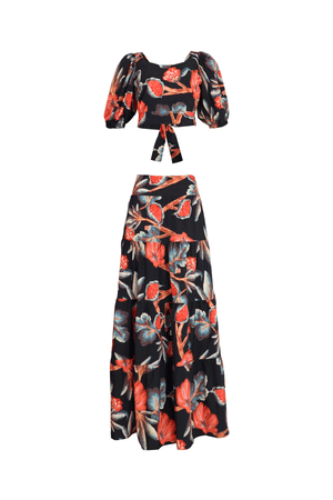 Set negro con estampado natural, crop top de tiras y falda larga.
